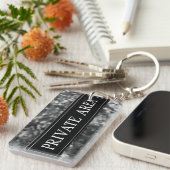 PORTE-CLÉS SYMBOLE DE ZONE PRIVÉE (Devant droit)