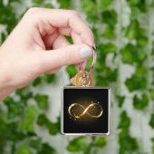 Porte-clés Symbole d'infini doré (main)