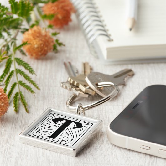 Porte-clés T Monogramm schwarz weiß Schlüsselanhänger (Côté)