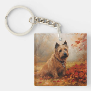 Porte-clés Terrier Australien dans les feuilles d'automne qui
