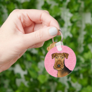 Porte-clés Tête de chien mignon Airedale Terrier sur des coeu