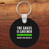 Porte-clés The Gr Is Greener Where You Water It, Motivational (Recto)