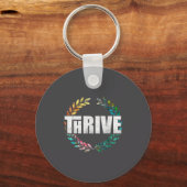 Porte-clés Thrive  (Recto)