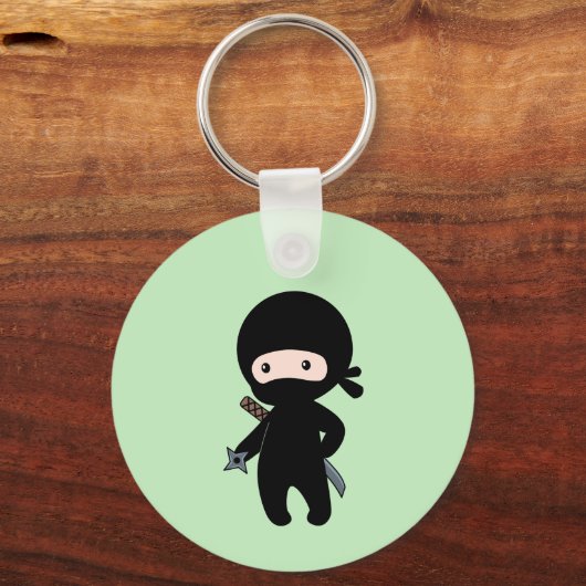 Porte-clés Tiny Ninja Holding Throwing Star sur Green (Verso)