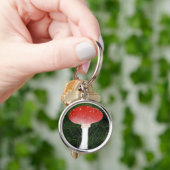 Porte-clés Toadstool Champignon dans les environs de la mouss (main)