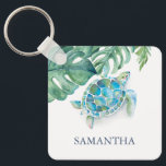 Porte-clés Tortue de mer personnalisée Tropical<br><div class="desc">Cette porte - clé tropicale a été conçue en utilisant mes feuilles originaux de tortue de mer couleur aquarelle et de palmier monstère dans les tons turquoise, bleu et vert. Personnalisez avec votre nom en bleu marine. Cliquez sur "Modifier à l'aide de l'outil de conception" pour customiser les couleurs et...</div>