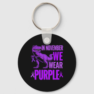 Porte-clés Trex Dinosaure En Novembre Nous Portons Du Violet