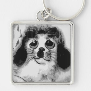 PORTE-CLÉS TRISTE CHIEN