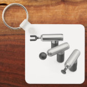 Porte-clés Trois pistolets de massage avec différentes têtes (Recto)