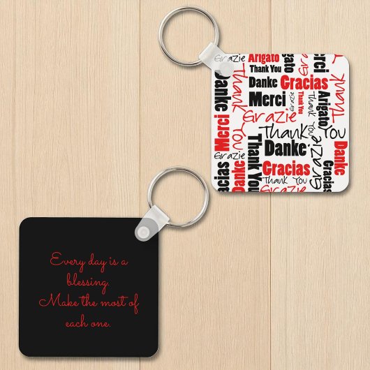 Porte-clés Typographie "Merci" multilingue noire rouge