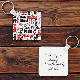 Porte-clés Typographie "Merci" multilingue noire rouge