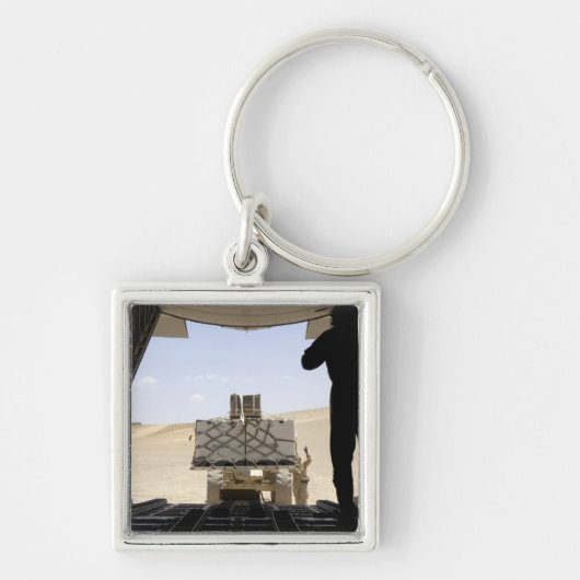 Porte-clés Un chariot élévateur transporte du fret sur un Her (Devant)