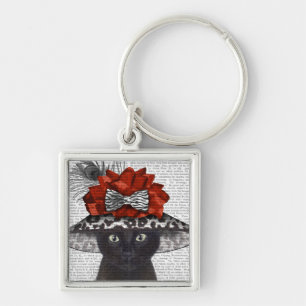 Porte-clés Un chat noir avec un Casquette fabuleux