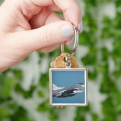 Porte-clés Un Faucon de combat F-16 en vol (main)