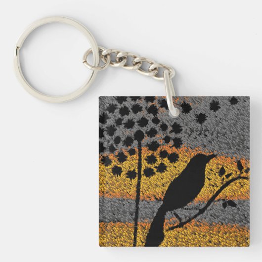 Porte-clés Un oiseau parmi les plumes (Devant)