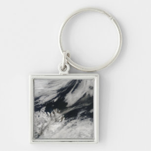 Porte-clés Un panache gris pâle souffle du sommet