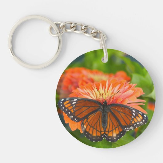Porte-clés Un papillon Monarque sur des Zinnia orange (Devant)