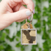 Porte-clés Un soldat américain marche le long d'un chemin de  (main)