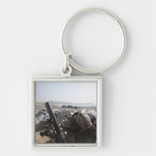 Porte-clés Un US Marine tire un mortier à Salinas, Pérou (Devant)