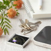 Porte-clés Une conception artiste du SGR 1806-20 magneta (Côté)