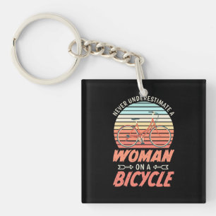 Porte-clés Une Femme En Vélo
