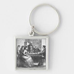 Porte-clés Une femme est en pourparlers avec un directeur