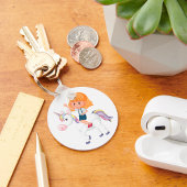 Porte-clés Une Fille Qui Mène Une Unicorne