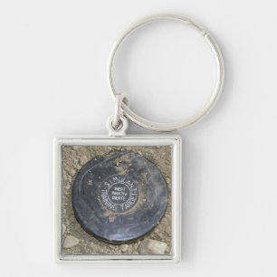 Porte-clés Une mine terrestre simulée