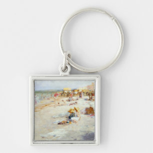 Porte-clés Une plage occupée en été