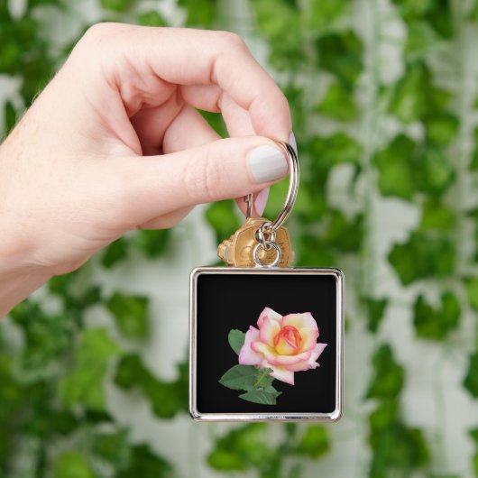 Porte-clés Une rose rose unique (main)