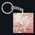 Porte-clés Van Gogh Almond Blossoms Peach<br><div class="desc">Fleurs d'amandes par Vincent Van Gogh, altération de couleurs copyright 2sweet4wordsDesigns/ PureVintage Love. Porte - clé Peachy Pink Almond Blossoms : Portez la beauté des fleurs d'amandes de Vincent Van Gogh avec vous partout où vous allez avec notre Porte - clé Peach Almond Blossoms. L'oeuvre emblématique brille sur fond de...</div>