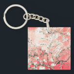 Porte-clés Van Gogh Almond Blossoms Peach<br><div class="desc">Fleurs d'amandes par Vincent Van Gogh, altération de couleurs copyright 2sweet4wordsDesigns/ PureVintage Love. Porte - clé Peachy Pink Almond Blossoms : Portez la beauté des fleurs d'amandes de Vincent Van Gogh avec vous partout où vous allez avec notre Porte - clé Peach Almond Blossoms. L'oeuvre emblématique brille sur fond de...</div>