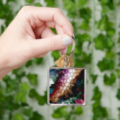 Porte-clés Vent foncé centré sur le cube (main)