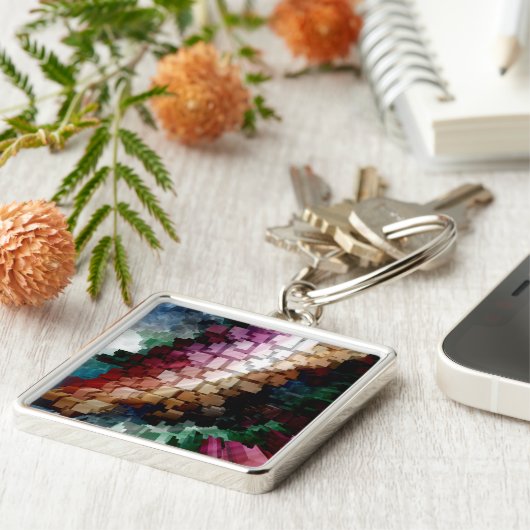 Porte-clés Vent foncé centré sur le cube (Côté)