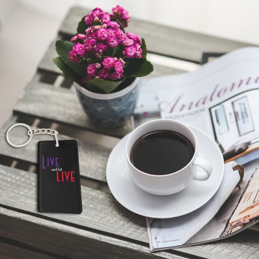 Porte-clés Vis et laisse vivre proverbe noir