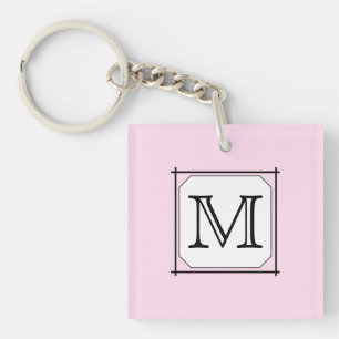 Porte-clés Votre lettre. Monogramme personnalisé. Blanc noir