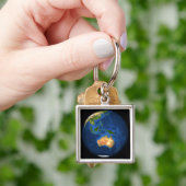 Porte-clés Vue de la Terre entière montrant Indonésie, Océan (main)