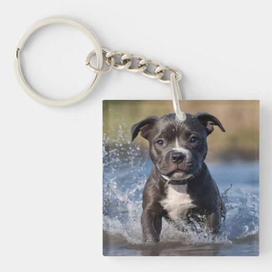 Porte-clés "Wave Chaser : Un chiot robuste en jeu dans l'océa (Devant)