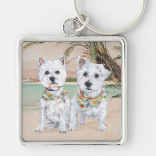 Porte-clés Westies sur une plage de palmiers