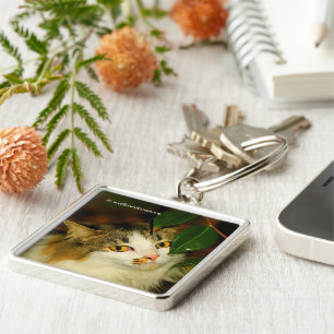 Porte-clés Whimsical Le chat et la feuille de Camellia