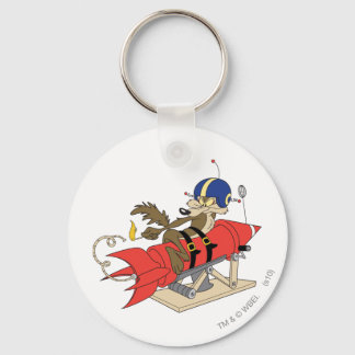 Porte-clés Wile E. Coyote lançant une fusée rouge
