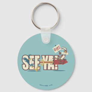 Porte-clés Wile E. Coyote Rocketing Past ROAD RUNNER™