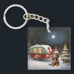 Porte-clés Winter Dachshund Caravan Christmas Adventure<br><div class="desc">Laissez-vous tenter par la magie d'une nuit d'hiver enneigée alors qu'une caravane glisse gracieusement à travers le paysage illuminé par la lune. La beauté sereine de la neige scintillante et l'éclat enchanteur de la lune créent une scène captivante, promettant une aventure de Noël inoubliable remplie de chaleur, de joie et...</div>