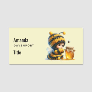 Porte-nom Mignonne fille en costume d'abeille avec miel
