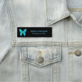 Porte-nom Papillon bleu turquoise sur Arrière - plan noir (En situation)