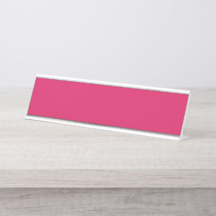 Porte-nom Pour Bureau Un tableau de fleurs rouges et roses avec l vert l