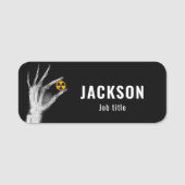 Porte-nom Tenir à la main un symbole de rayonnement (Devant)