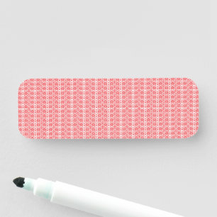 Porte-nom un arrière - plan rouge et blanc avec un motif
