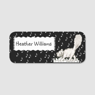Porte-nom White Winking Chat sur les touches de piano Notes