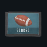 Portefeuille À 3 Volets Garçons Cool et Sporty American Football Enfants<br><div class="desc">Ce porte-monnaie cool et moderne présente une illustration de football américain/rugby et peut être personnalisé avec le nom de votre garçon dans une typographie sportive. Parfait pour un passionné de sport !</div>